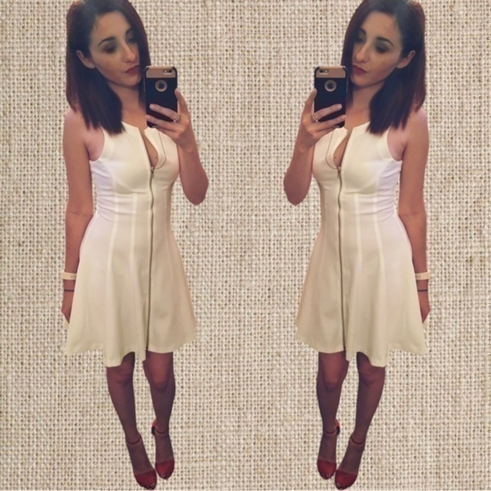 White fitted zipper down flair dress